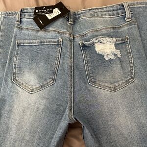 Fashion Nova skinny light blue wash.